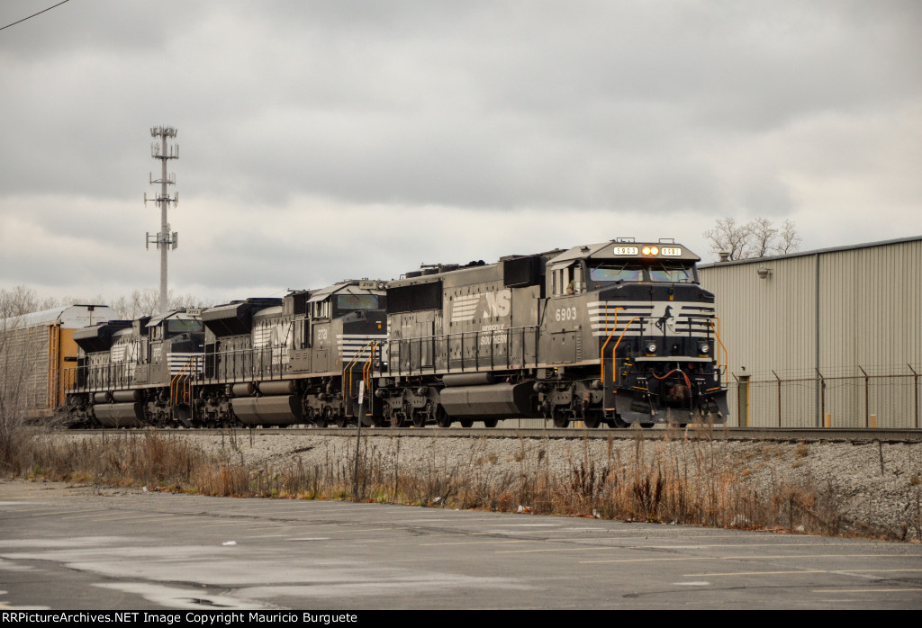 NS SD60E Locomotive leading a train